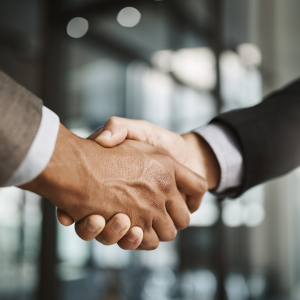 closeup-business-men-giving-handshake-hiring-employee-welcoming-company-meeting-modern-office-together-corporate-professionals-making-deals-agreements-showing-teamwork 2